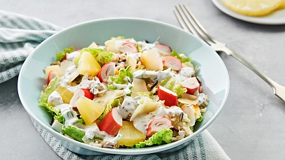 Salad with crab sticks, wild rice and pineapple