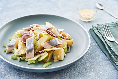 Potato salad with herring, apple and celery