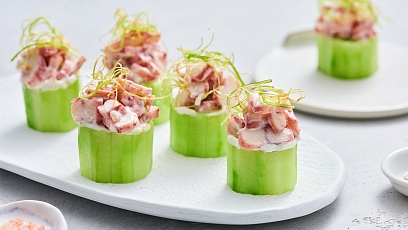 Cucumber filled with squid in garlic sauce