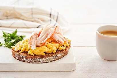 Toast with scrambled eggs and snow crab