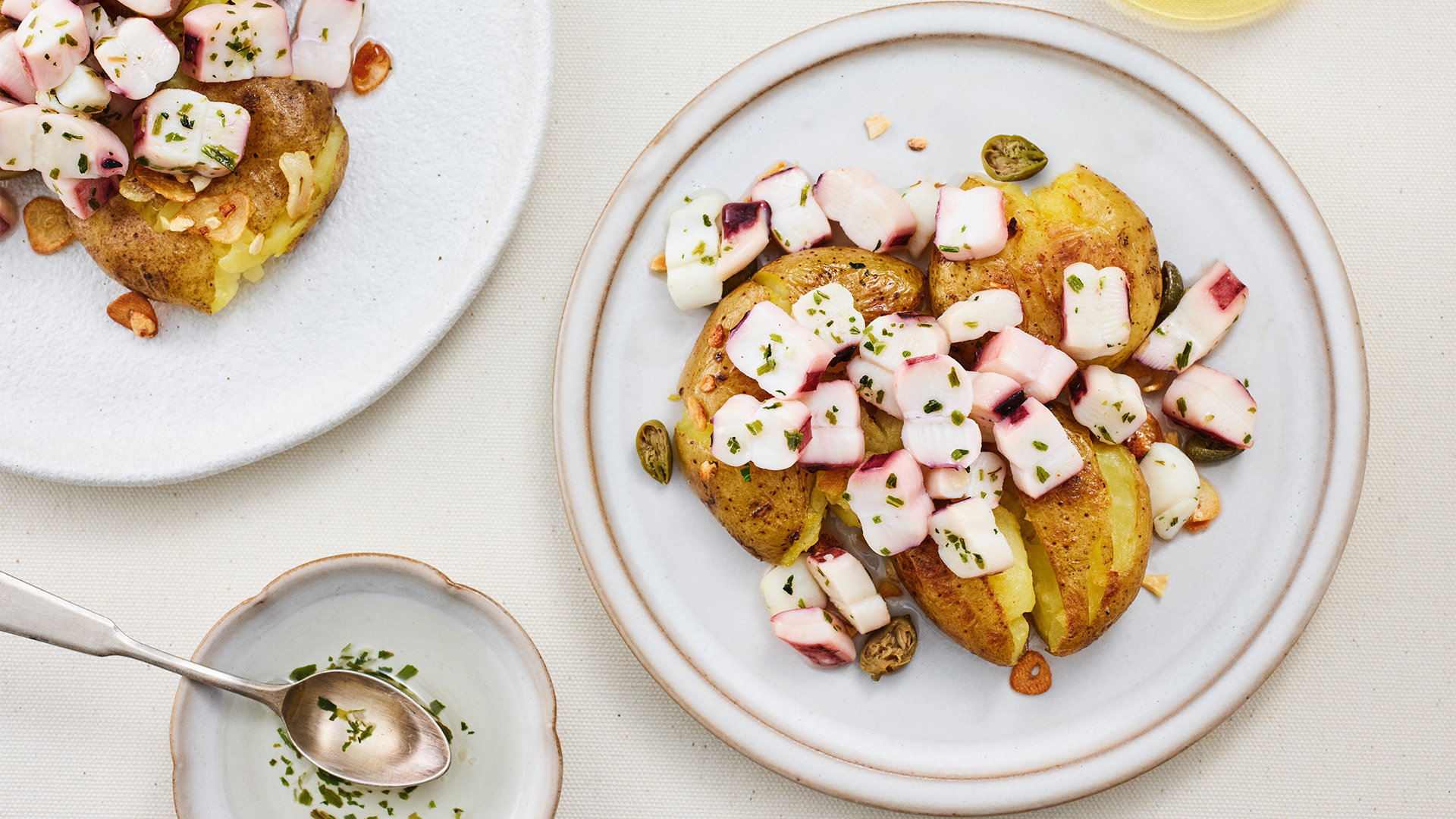 Baked potato with squid pieces